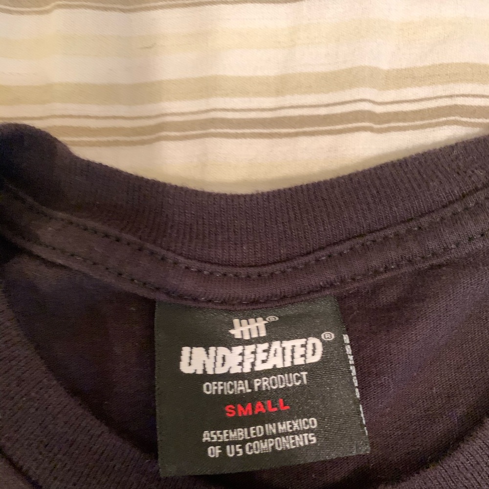 Black and red undefeated t-shirt